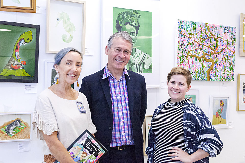 Mandy Dollery and Clare Holder from Geelong Illustrators with Mayor Bruce Harwood (centre)